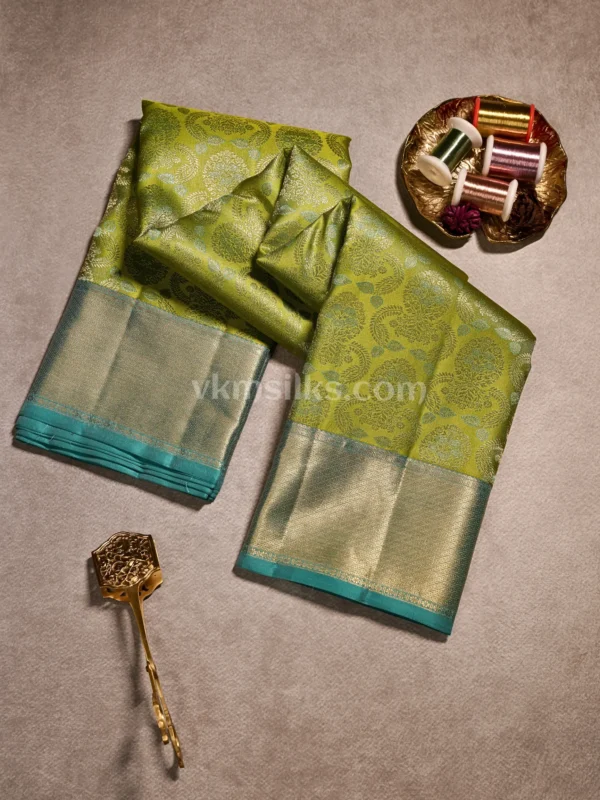 Parrot Green Body and Peacock Blue Border Pure Kanjivaram Saree