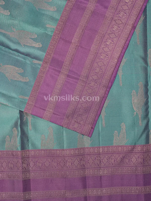 Seafoam Turquoise Body and Soft Lavender–Purple Border Pure kanjivaram saree