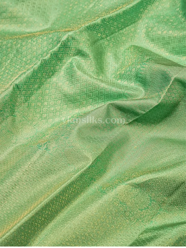 Soft Mint Green with a gentle pastel sheen Pure Kanjivaram Saree