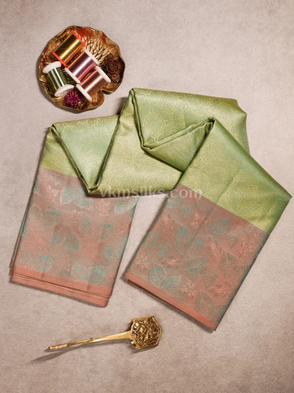 Soft Pista Green Body and Peach-Rose Pink  3D Embossed Border Pure kanjivaram saree