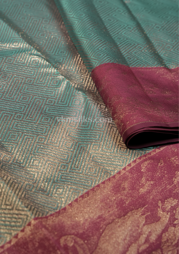 9 - 2026-04-08T165117.430 Teal Blue Silk Saree with Rani Pink Zari Border | Elegant Wedding & Festive Wear