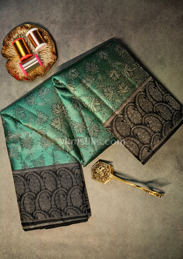 Elegant Emerald Green Silk Saree with Black Zari Border