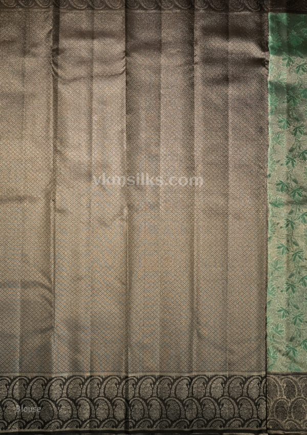 Elegant Emerald Green Silk Saree with Black Zari Border