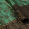 Elegant Emerald Green Silk Saree with Black Zari Border