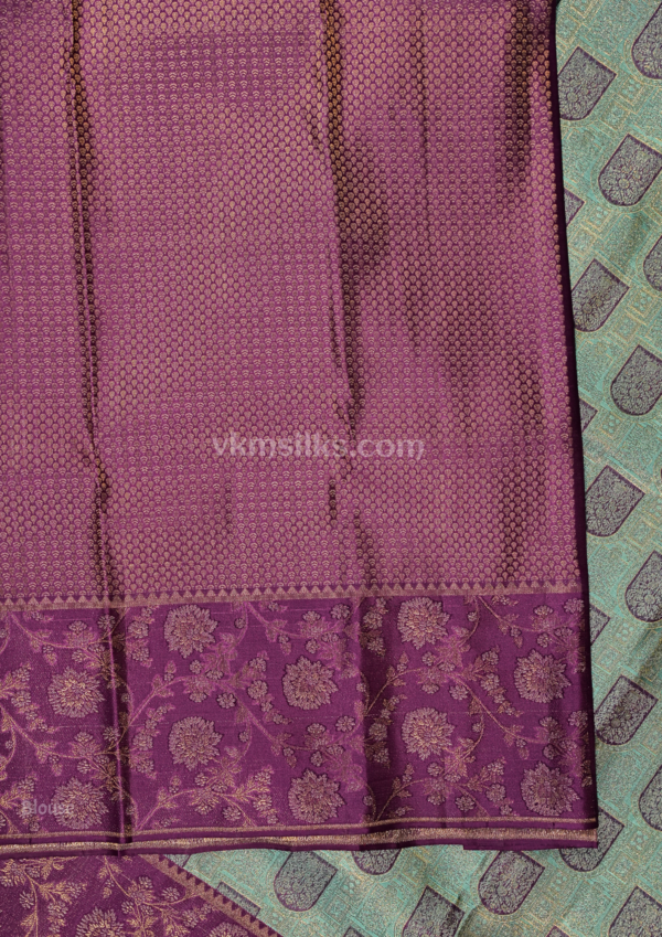 9 - 2026-05-20T164024.143 Sea Green Soft Silk Saree with Royal Purple Zari Border