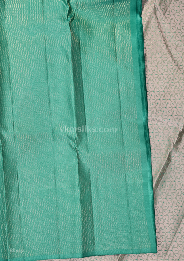 9 - 2026-08-26T161351.257 Dusty Rose Pink & Peacock Green Pure Silk Saree with Elegant Zari Floral Border