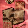 9 - 2026-09-03T165513.151 Brown meenakari stripes body with green highlighted floral border brocade saree