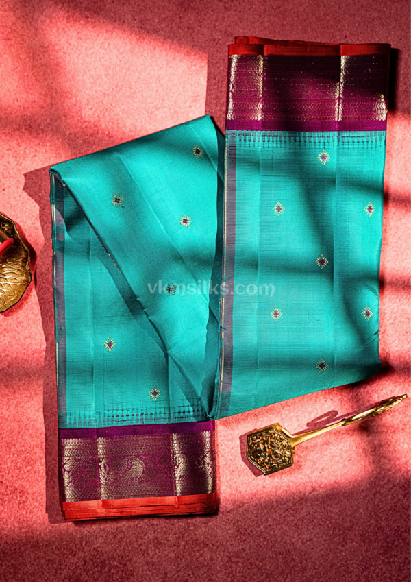 9 - 2026-09-05T105242.481 Peacock blue with purple traditional butta kanjivaram