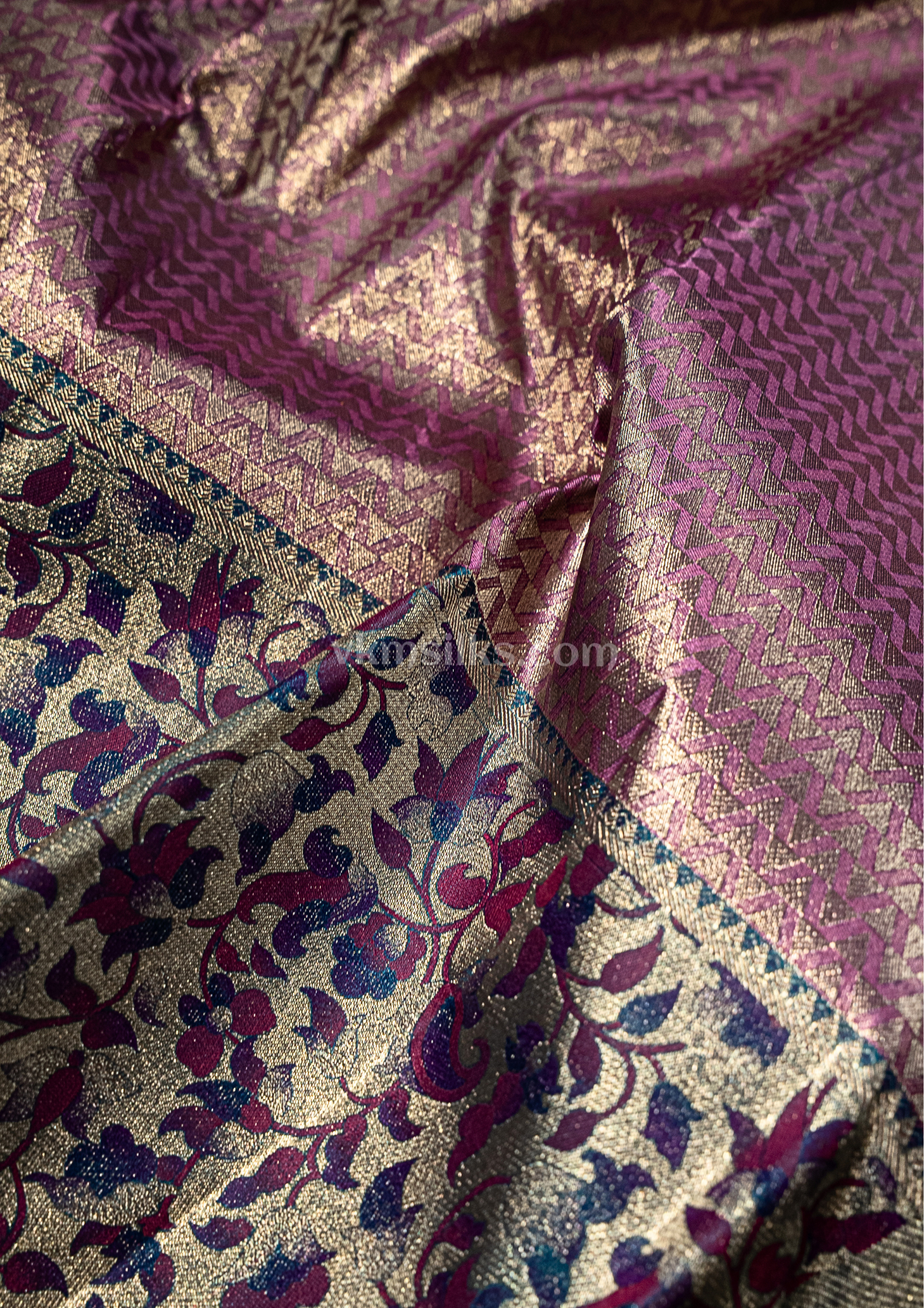 Geometric patterned Plum body with vine floral dark blue border alternative pallu & zari angle view