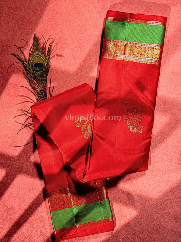 9 (26) Bright red body with green and gold silver border