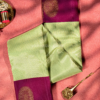 Green podi kattam and magenta chakram butta bordered pure kanjivaram