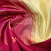 Green podi kattam and magenta chakram butta bordered pure kanjivaram